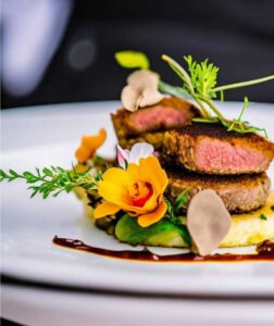 Illustration de Expériences gastronomiques extraordinaires à l’étranger : Découvrez les restaurants étoilés Michelin